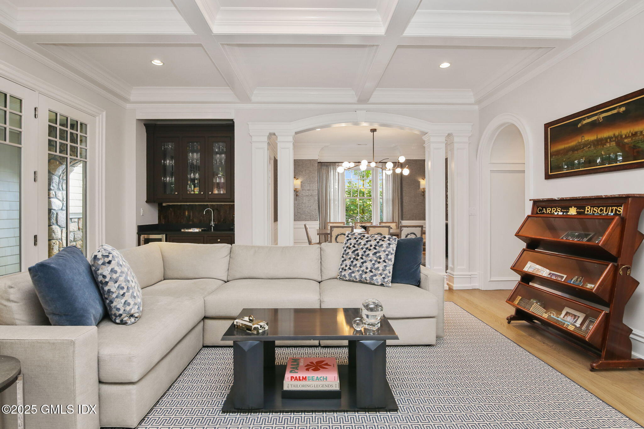 50 Sound View Drive, Unit 4N Greenwich, CT 06830 - Photo 3 of 20 a living room with furniture and a flat screen tv