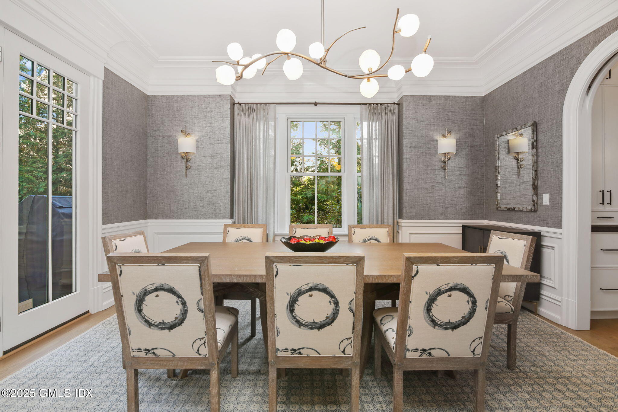 50 Sound View Drive, Unit 4N Greenwich, CT 06830 - Photo 5 of 20 a view of a dining room with furniture window and wooden floor