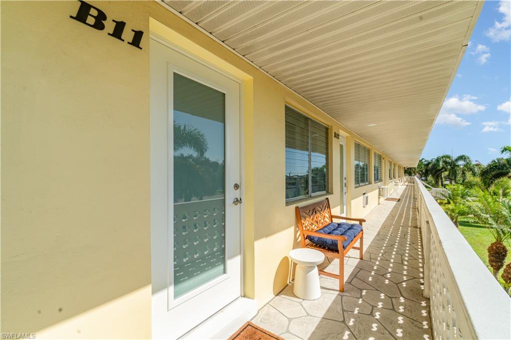 473 12th Avenue South, Unit B11 Naples, FL 34102 - Photo 14 of 18 a view of deck with patio