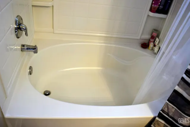 a bathroom with a bathtub