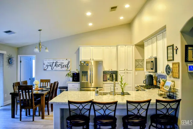 a view of a dining room with furniture