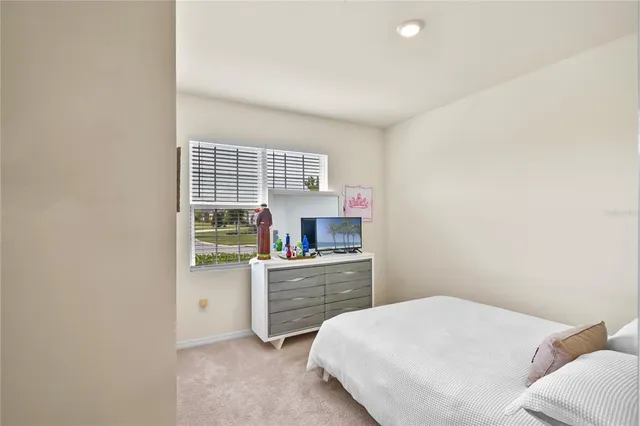 a kitchen with a stove a sink and a refrigerator
