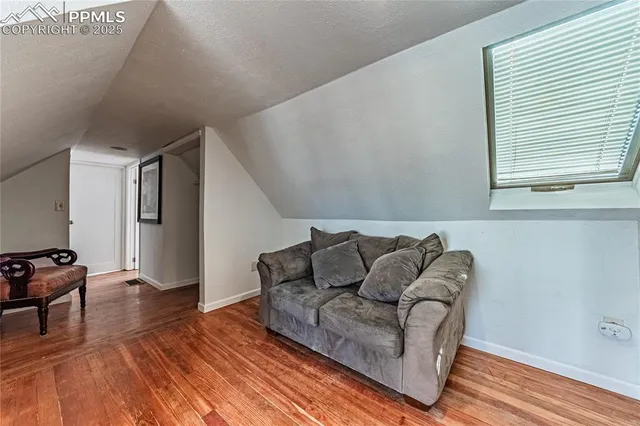 a view of a livingroom with wooden floor