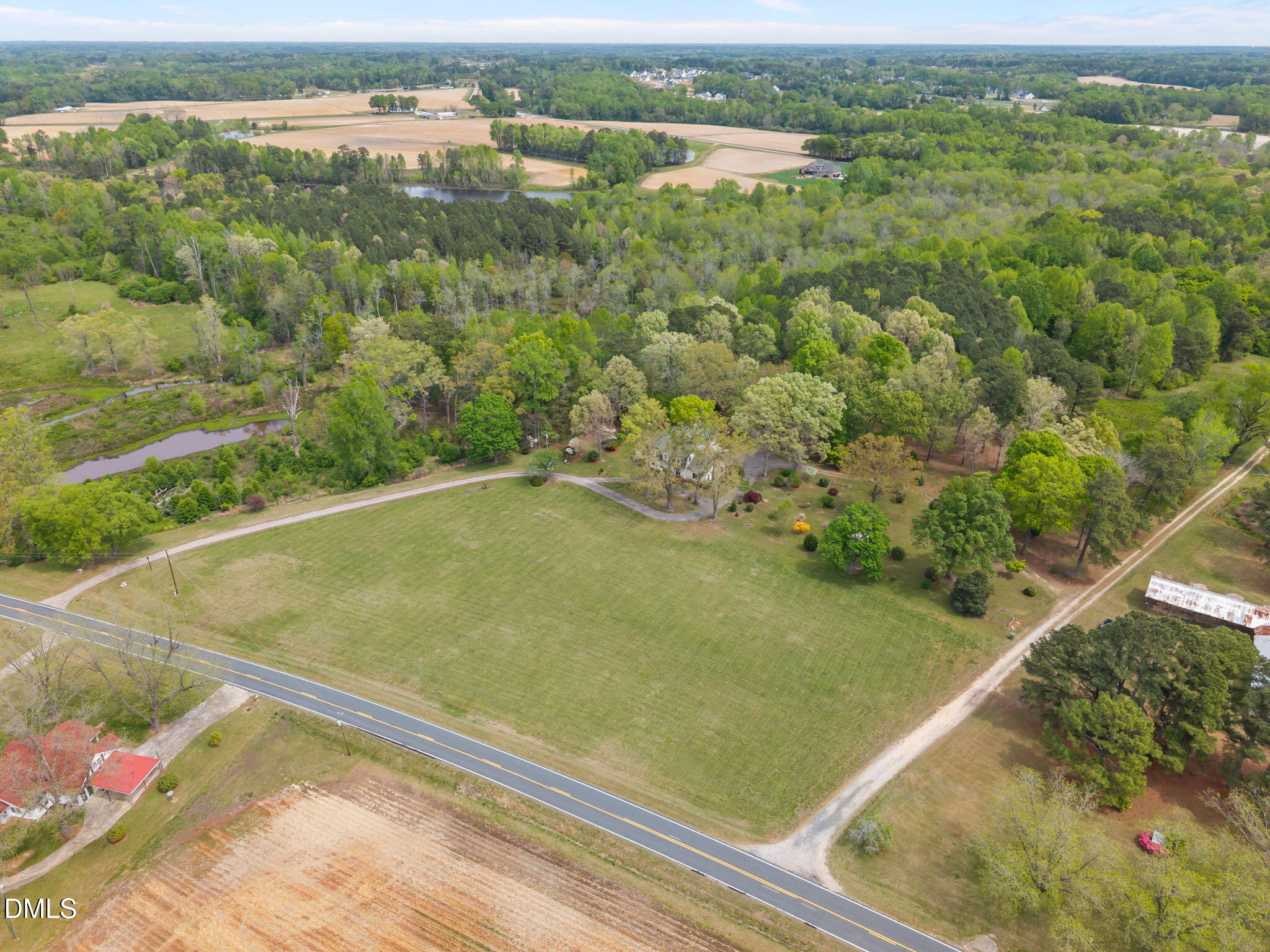 1094 Guy Road Angier, NC 27501 - Photo 79 of 80 79-web-or-mls-DJI_20260407125227_0929_D