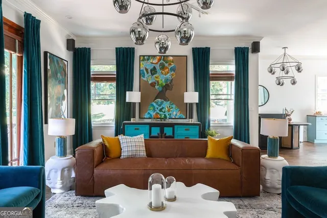 a living room with furniture and a window