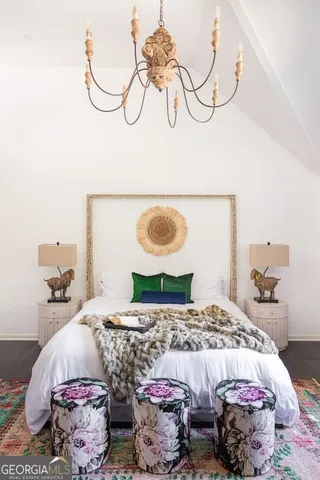 a bedroom with furniture and a bed