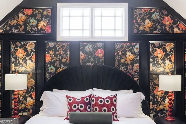 a bathroom with a shower and mirror