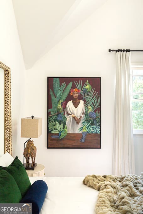 201 Hurt Street Northeast, Unit ENTIRE Atlanta, GA 30307 - Photo 19 of 61 a bedroom with furniture and a bed