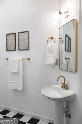 a living room with furniture ceiling fan and a rug