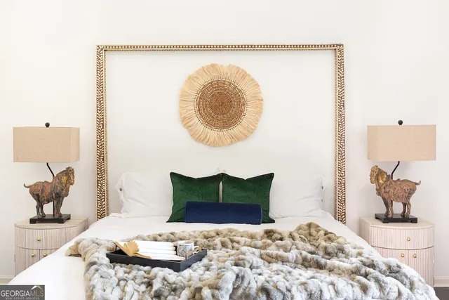 a bathroom with a sink toilet and mirror