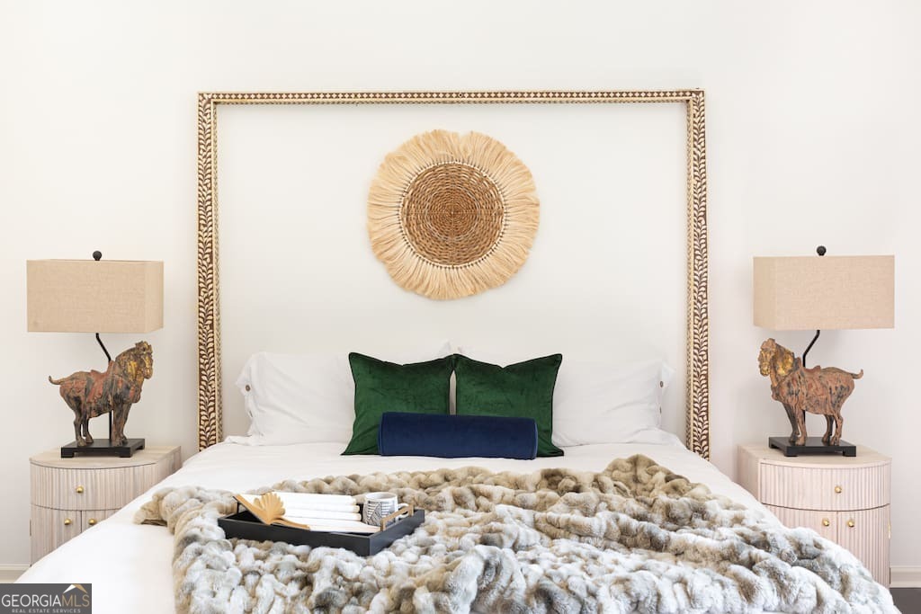 201 Hurt Street Northeast, Unit ENTIRE Atlanta, GA 30307 - Photo 24 of 61 a bedroom with a bed and a painting on the wall