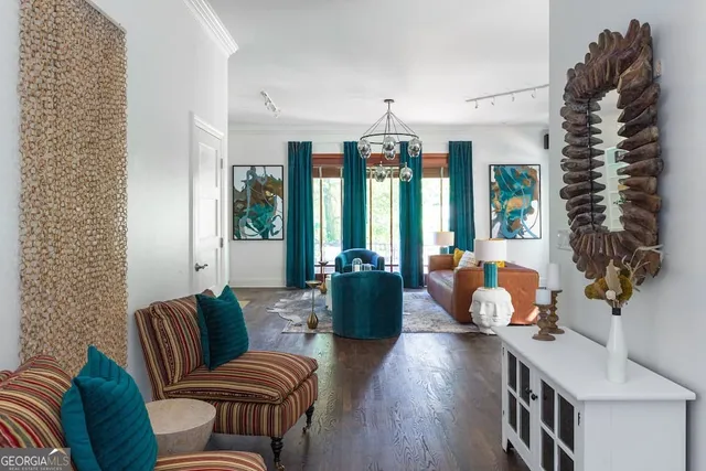 a bedroom with a bed and a potted plant