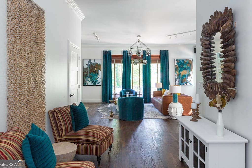 201 Hurt Street Northeast, Unit ENTIRE Atlanta, GA 30307 - Photo 27 of 61 a living room with furniture and wooden floor