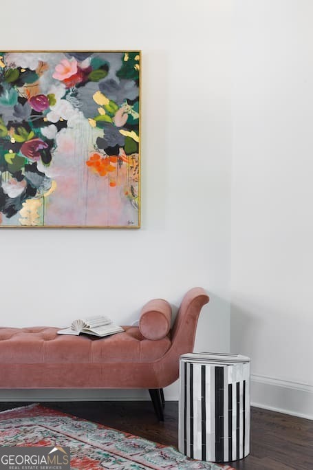 201 Hurt Street Northeast, Unit ENTIRE Atlanta, GA 30307 - Photo 28 of 61 a bedroom with a bed and painting on the wall