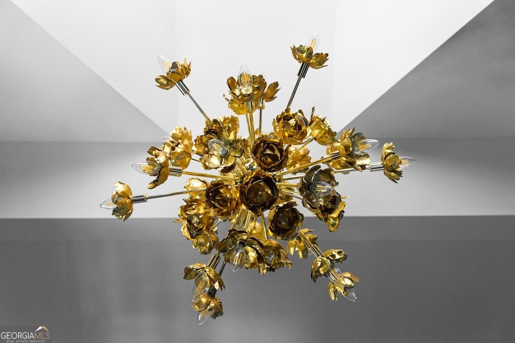 201 Hurt Street Northeast, Unit ENTIRE Atlanta, GA 30307 - Photo 3 of 61 a vase of flowers sitting on a table