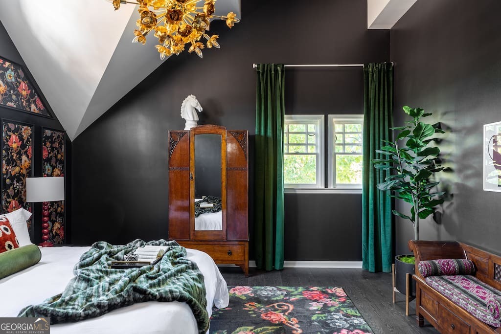 201 Hurt Street Northeast, Unit ENTIRE Atlanta, GA 30307 - Photo 34 of 61 a bedroom with a bed and a potted plant