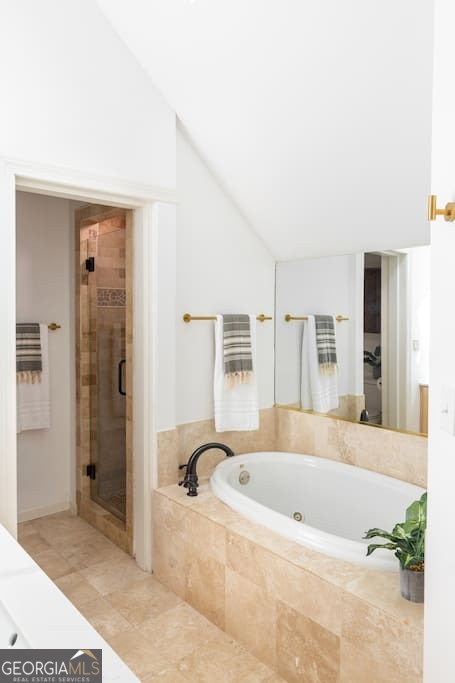 201 Hurt Street Northeast, Unit ENTIRE Atlanta, GA 30307 - Photo 36 of 61 a white bath tub sitting in a en suite bathroom