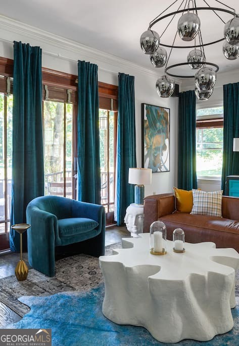 201 Hurt Street Northeast, Unit ENTIRE Atlanta, GA 30307 - Photo 37 of 61 a living room with furniture and a large window