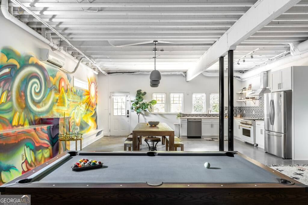 201 Hurt Street Northeast, Unit ENTIRE Atlanta, GA 30307 - Photo 44 of 61 a living room with furniture and a table