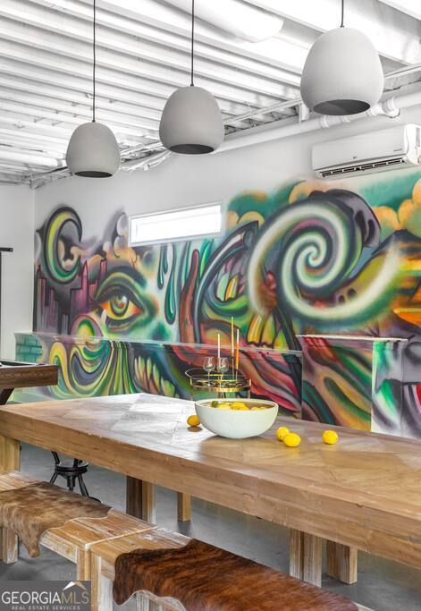 201 Hurt Street Northeast, Unit ENTIRE Atlanta, GA 30307 - Photo 45 of 61 a bathroom with a sink and a mirror