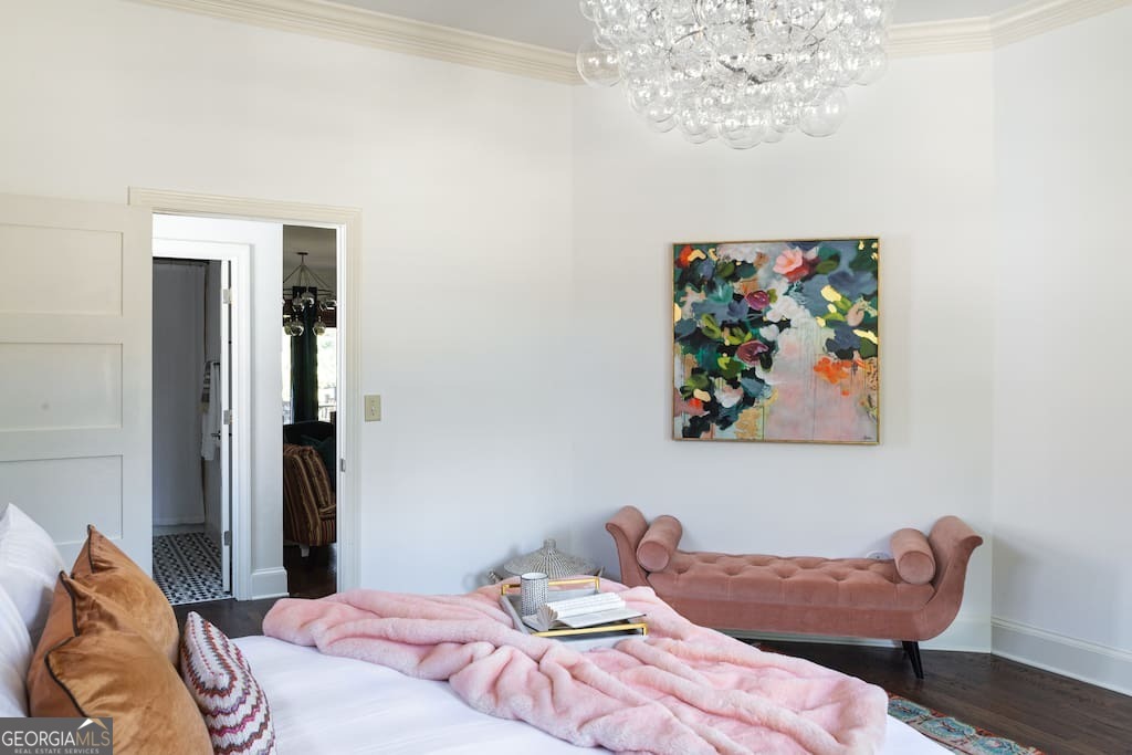 201 Hurt Street Northeast, Unit ENTIRE Atlanta, GA 30307 - Photo 5 of 61 a bedroom with a bed and a painting on the wall