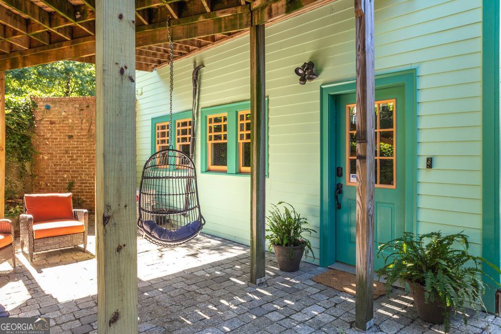 201 Hurt Street Northeast, Unit ENTIRE Atlanta, GA 30307 - Photo 55 of 61 a pathway of a house with a yard