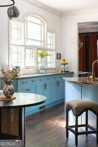 a vase of flowers sitting on a table