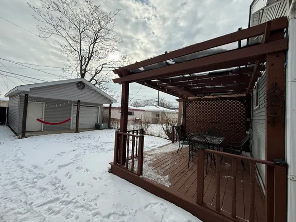 a view of house with patio