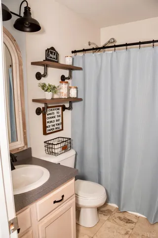 a bathroom with a sink and a toilet