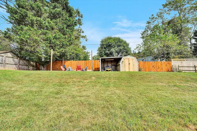 a view of a house with a swimming pool