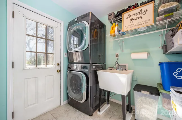 a backyard of a house with barbeque oven
