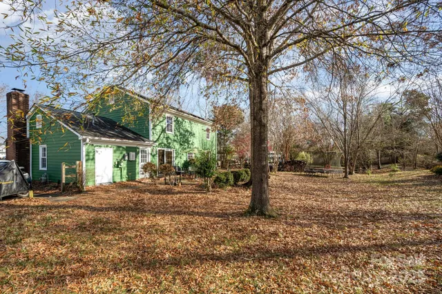 a house view with a backyard space