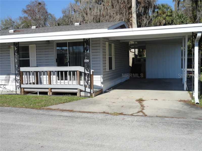 1114 Rue De Dore Tavares, FL 32778 - Photo 2 of 14 Exterior Front