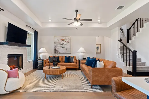 a living room with furniture and a window
