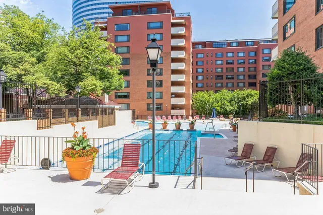 a view of a chairs and table in the patio
