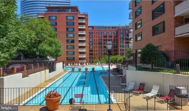 a view of a chairs and table in the patio