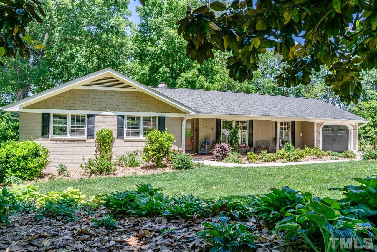 3318 Hampton Road Raleigh, NC 27607 - Photo 1 of 56 a front view of a house with a yard and porch