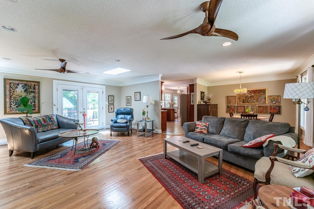 3318 Hampton Road Raleigh, NC 27607 - Photo 12 of 56 a living room with furniture and a wooden floor