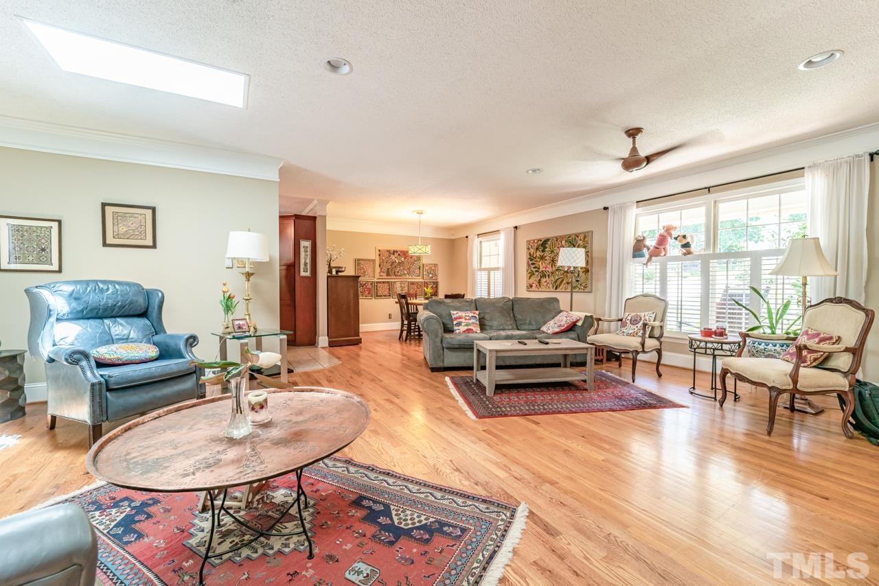 3318 Hampton Road Raleigh, NC 27607 - Photo 15 of 56 a living room with furniture and a large window