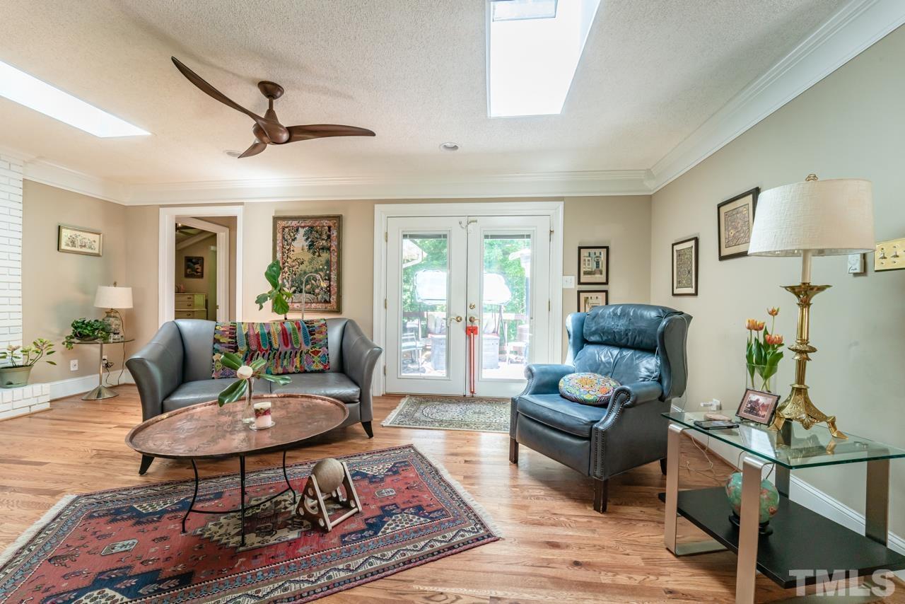 3318 Hampton Road Raleigh, NC 27607 - Photo 16 of 56 a living room with furniture and a table