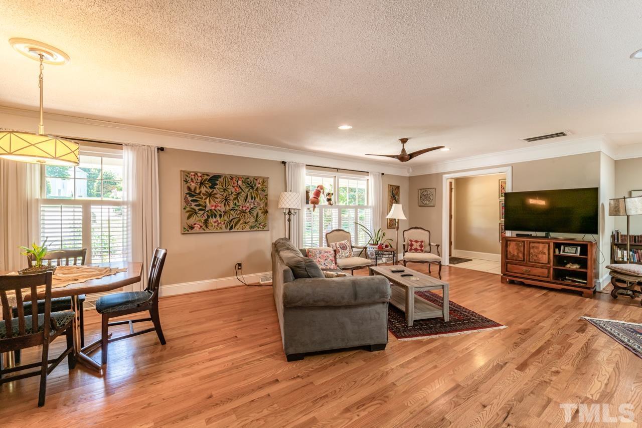 3318 Hampton Road Raleigh, NC 27607 - Photo 17 of 56 a living room with furniture and a flat screen tv