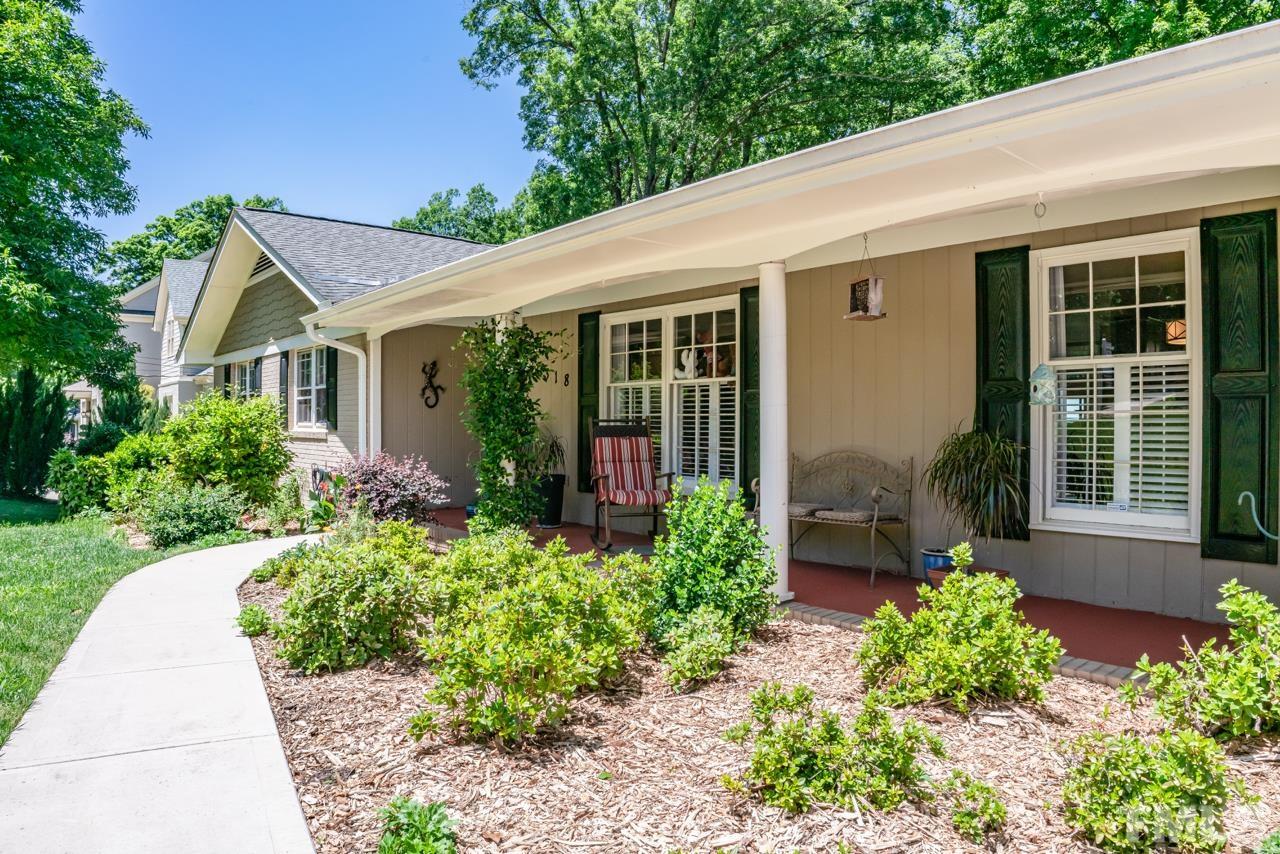 3318 Hampton Road Raleigh, NC 27607 - Photo 3 of 56 a front view of a house with garden