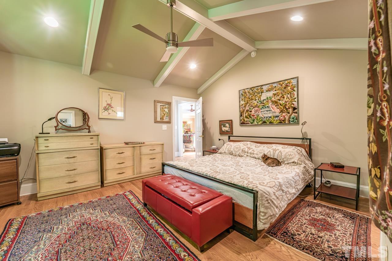 3318 Hampton Road Raleigh, NC 27607 - Photo 41 of 56 a bedroom with a bed and dresser