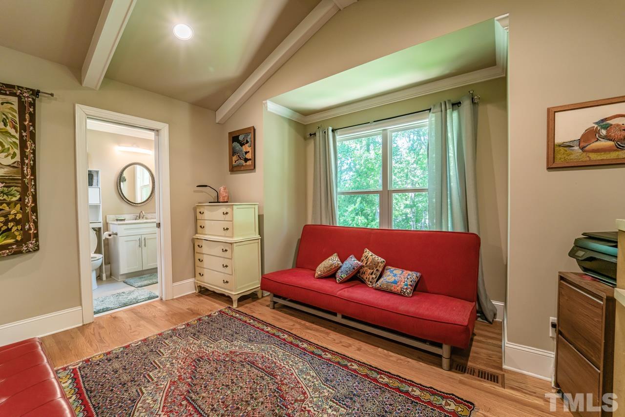 3318 Hampton Road Raleigh, NC 27607 - Photo 43 of 56 a living room with furniture rug and window