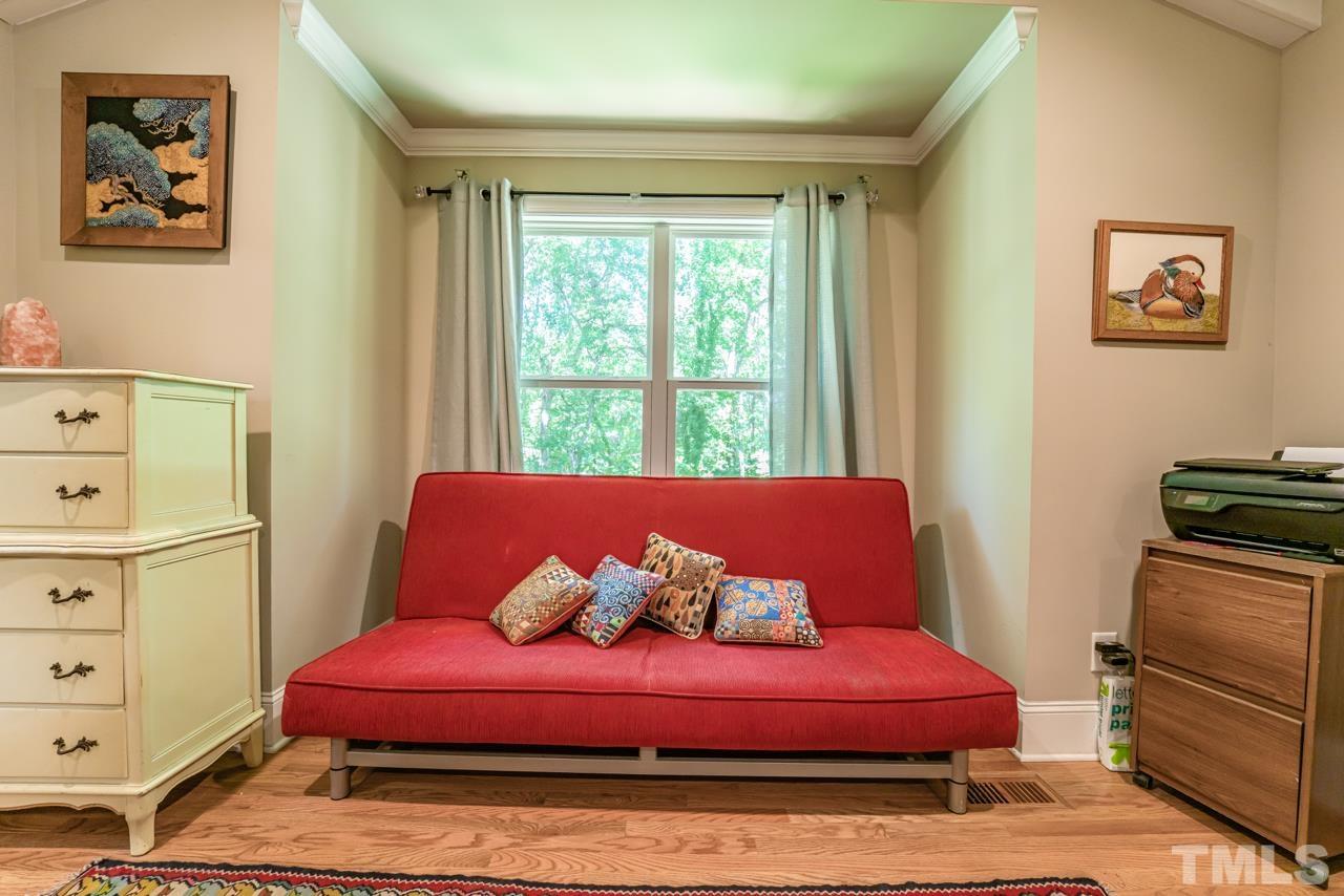 3318 Hampton Road Raleigh, NC 27607 - Photo 44 of 56 a bedroom with a bed and a dresser