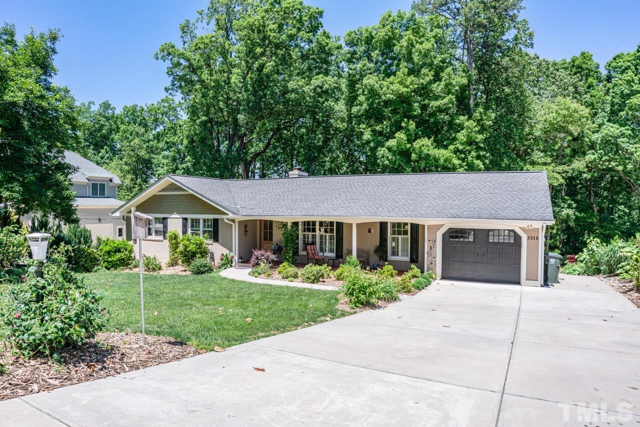3318 Hampton Road Raleigh, NC 27607 - Photo 6 of 56 front view of a house with a yard