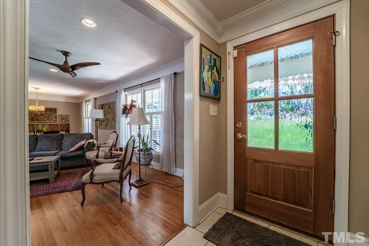 3318 Hampton Road Raleigh, NC 27607 - Photo 7 of 56 a view of a livingroom with furniture and hardwood floor