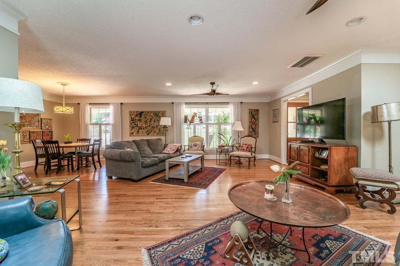 3318 Hampton Road Raleigh, NC 27607 - Photo 10 of 56 a living room with furniture and a flat screen tv