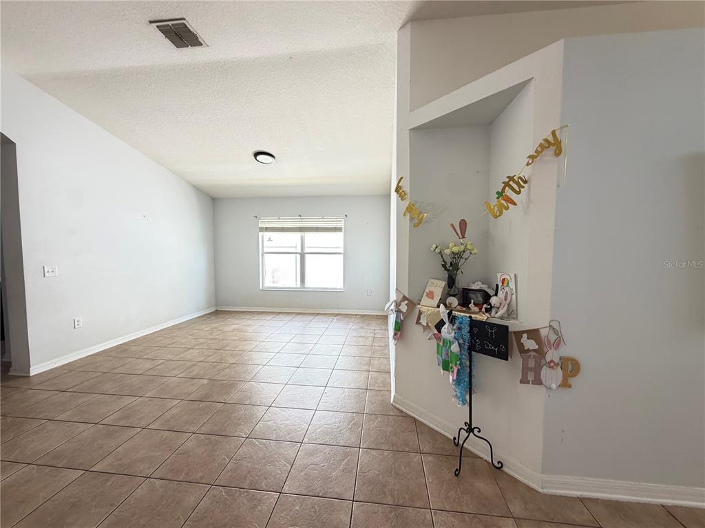 945 Tramells Trail Kissimmee, FL 34744 - Photo 5 of 36 a view of a workspace