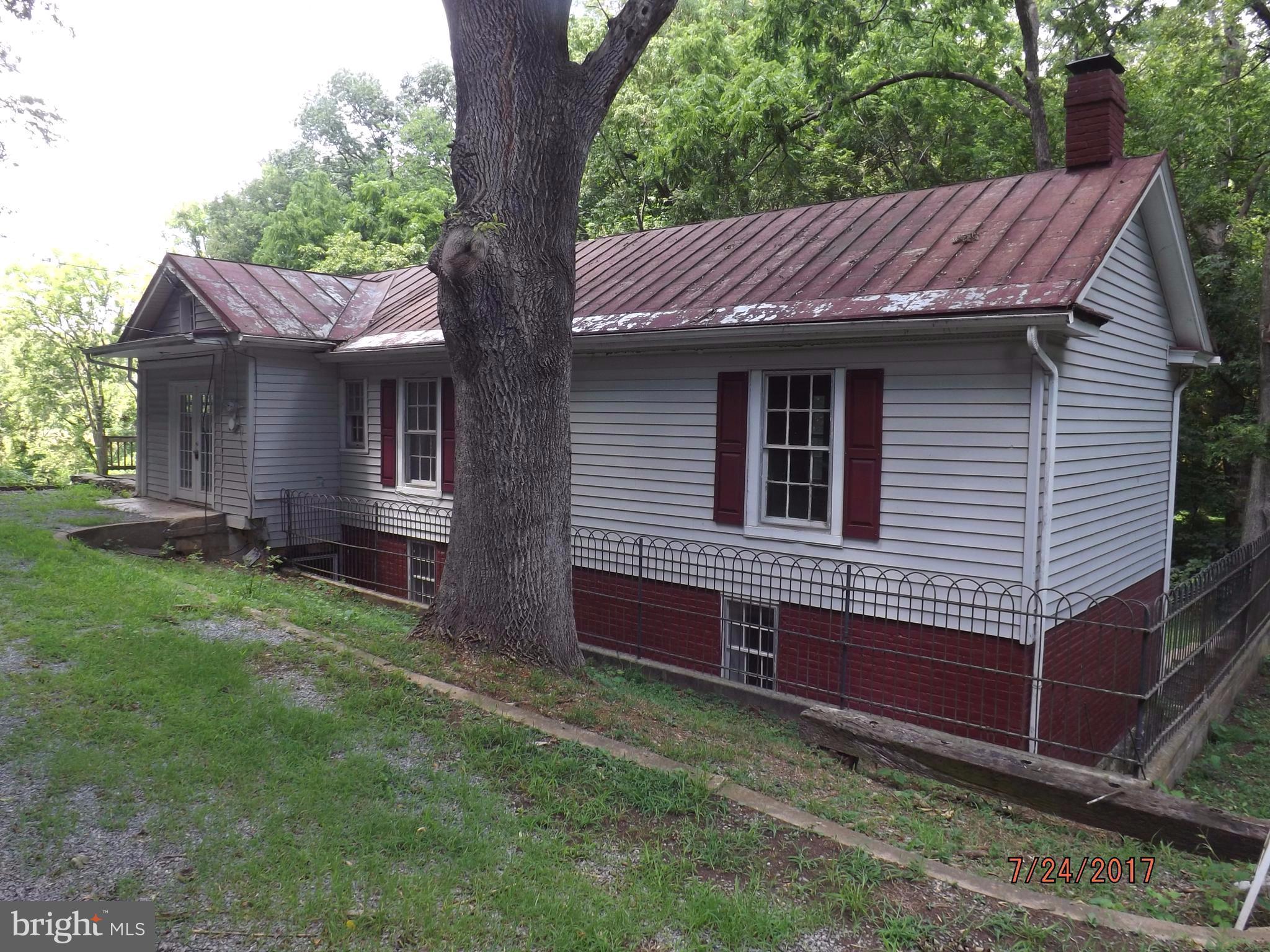 10 Big Spring Street Luray, VA 22835 - Photo 2 of 14 a view of a house with a yard